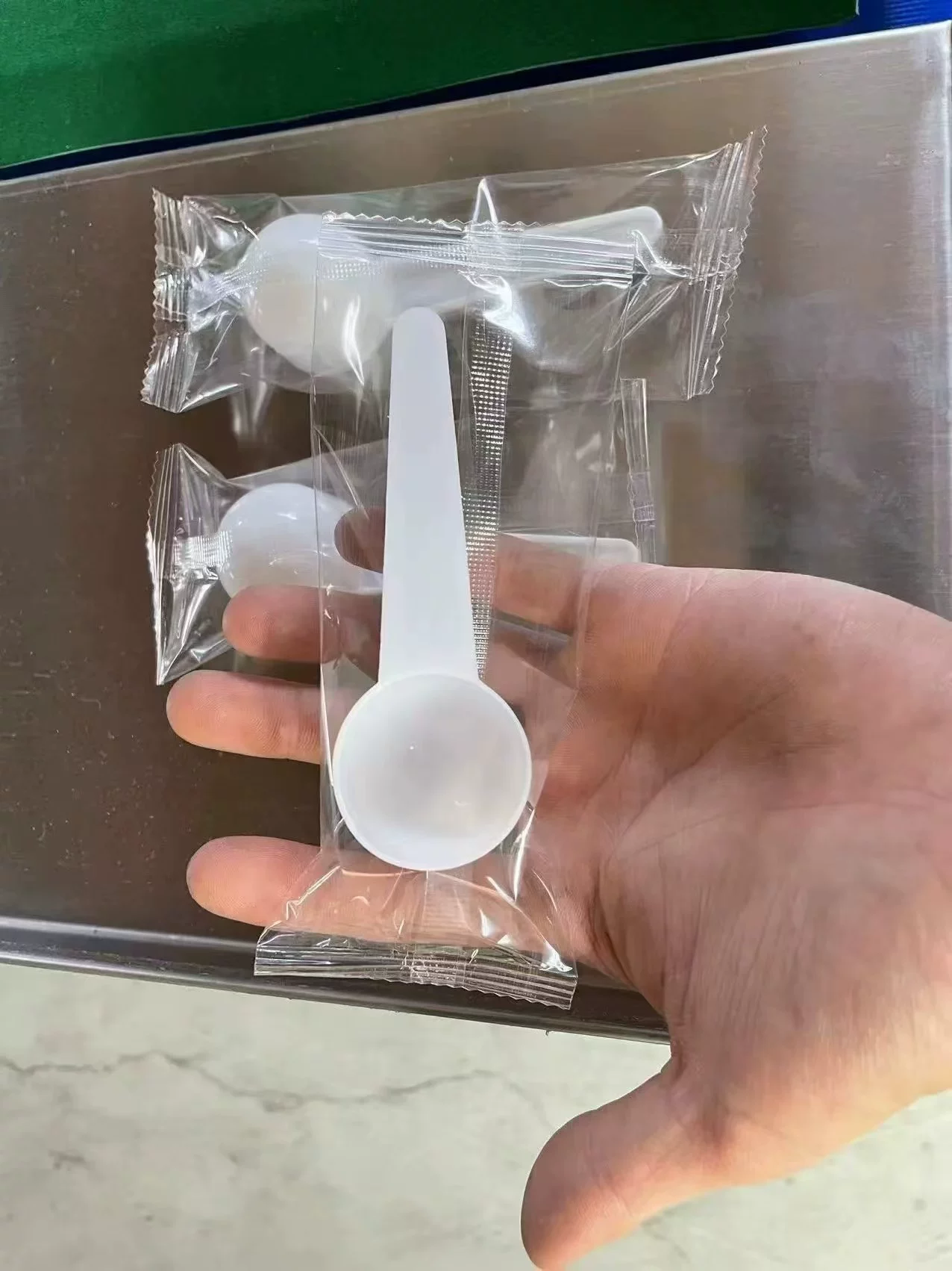 Individually flow wrapped plastic spoon packaging sample